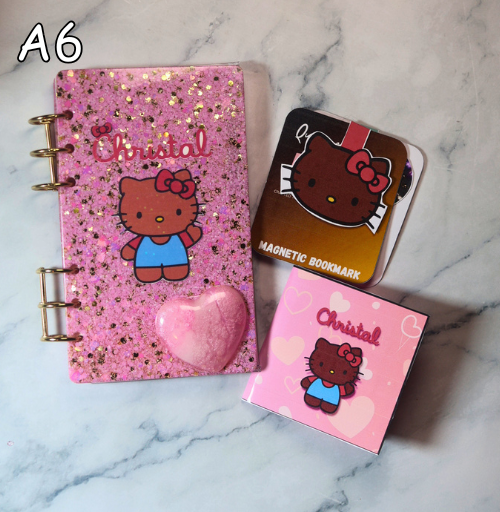 Handmade glitter resin notebook used for journaling and planning