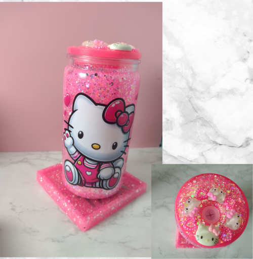 Pink custom snow globe tumbler with floating glitter, featuring a Hello Kitty design and matching pink lid, handmade personalized drinkware