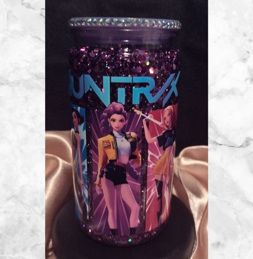 Purple glitter custom snow globe tumbler featuring anime-style character designs with floating sparkle, handmade drinkware