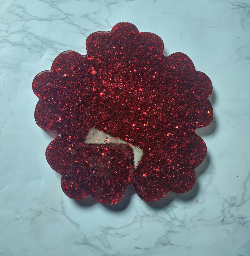 Handmade flower shaped resin coaster with glitter and glossy decorative finish